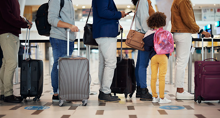 Image showing Airport queue, travel and people legs for international vacation, holiday or immigration with suitcase and kid. Line or group of women, men and child with luggage waiting for global flight schedule