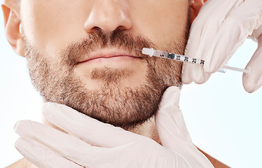 Image showing Man, lip filler injection and mesotherapy with face, hands and needle syringe and beauty on blue background. Dermatology, cosmetic care and procedure, health and skincare with wellness and collagen