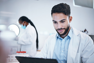 Image showing Science, research and tablet with man in laboratory for medicine, pharmacy and healthcare vaccine. Medical, internet and technology with expert reading data for experiment, investigation and cure