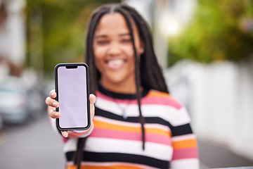 Image showing Mockup, phone and portrait, screen and black woman in road for travel, advertising and copy space. Face, smartphone and display by student traveling, connect or social media app on blurred background