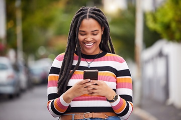 Image showing Black woman with smartphone in city, happy outdoor with technology, chat and communication, travel and fashion. Social media, urban street and adventure with happiness, connectivity and 5g in Jamaica