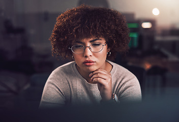 Image showing Night, computer and black woman programmer, software development and cybersecurity analysis. Focus, thinking and person working, network monitor and information technology programming at USA company