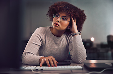 Image showing Thinking, confused and night with a black woman programmer working late in her office for cybersecurity. Idea, doubt and overtime with a female developer at work for research or data analysis