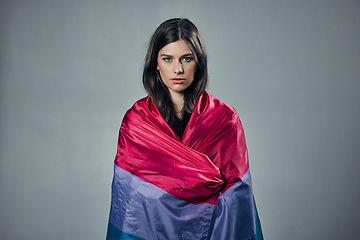 Image showing Bisexual flag, pride and woman in portrait, lgbtq and freedom to love, inclusion and equality, protest for human rights. Gay, trans and lesbian identity, politics and community on studio background