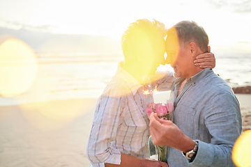 Image showing Flare, mockup and romance on the beach with an old couple outdoor in nature to celebrate valentines day. Summer, love or flowers with a senior man and woman celebrating on the coast together