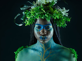 Image showing Plant crown, black woman and beauty of face with makeup on dark background with tropical leaf. Fairy model person or Queen of nature, ecology and sustainability for freedom art with natural wreath