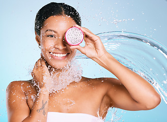 Image showing Dragon fruit, beauty and skin care woman portrait for healthy skin and diet on a blue background. Face of aesthetic model person with water splash and food for sustainable facial health and wellness