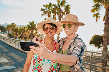 Image showing Happy friends, selfie and holiday smile in Miami with happiness from summer travel and vacation. Beach, mobile connection and online mature women by the sea with happiness on 5g for social media