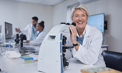 Image showing Senior woman, microscope and portrait of scientist in laboratory for research, experiment or innovation. Science, medical technology and happy elderly female doctor with equipment for sample analysis