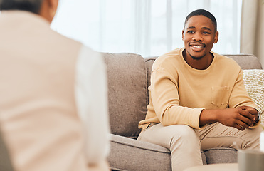 Image showing Black man, counseling and psychology consulting for therapy, mental healthcare or support. Happy patient talking to psychologist, therapist and medical help in consultation, advice and wellness check