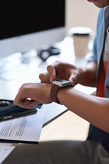 Image showing Technology, communication and businessman with smartwatch on arm at desk, mobile app and digital access to work network. Freelance worker checking time, online schedule or message on watch in office.