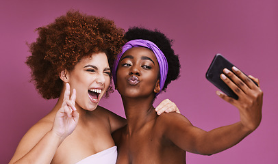 Image showing Phone, skincare and friends with peace sign for selfie on purple background for wellness, fashion and cosmetics. Beauty, makeup and happy women on smartphone for social media, picture and online post