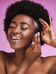 Image showing Black woman, hair and smile with afro conditioner, haircare and ethnic texture on pink studio background. African model, cosmetics cream product and scalp relaxer for maintenance, skincare and beauty