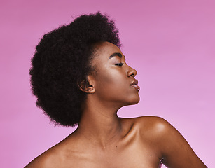 Image showing Black woman, afro beauty and skincare on pink background for aesthetic facial, cosmetics and glow. Young african, studio model and curly hair for dermatology, wellness and laser salon transformation