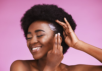 Image showing Happy black woman, afro hair and conditioner treatment for ethnic texture on pink studio background. African model, haircare cosmetics and cream product for scalp, skin relaxer and beauty maintenance