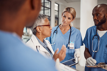 Image showing Group of doctors, planning management in hospital and workflow of medical student with training manager on tablet. Nurses, professional healthcare people and technology for surgery problem solving