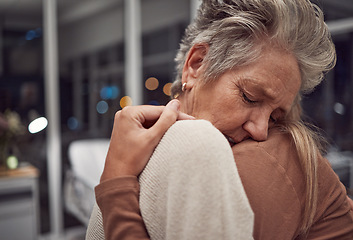 Image showing Hug, support and family at hospital to comfort after cancer diagnosis, disease or illness at night. Sad, depression and senior woman and girl hugging, embrace or cuddle for empathy, love and hope.