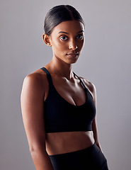 Image showing Fitness, workout and motivation with portrait of indian woman for training, sports and wellness goals. Exercise, diet and mindset with girl athlete for mission, cardio and health in studio background