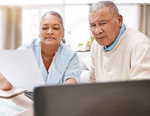 Image showing Senior black couple, documents and laptop for planning, budget and taxes with talk for future in home. Old man, woman and reading pc screen for insurance, retirement or finance goals with paperwork