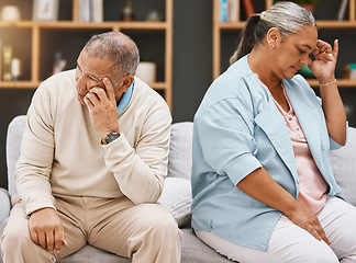 Image showing Fight, depression and divorce with old couple on sofa for breakup, sad and frustrated. Stress, mental health and crisis with elderly man and woman in living room at home for toxic, conflict and fail