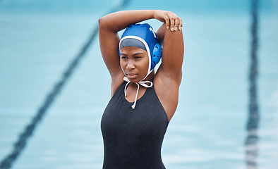 Image showing Water polo, sports and stretching with black woman at swimming pool for health, workout and fitness. Wellness, relax and warm up with arm of girl athlete for cardio, training and exercise goals