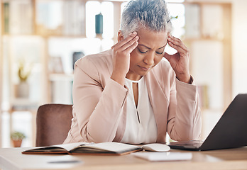 Image showing Headache, accountant or burnout woman on laptop for financial crisis, mental health or invest depression in office. Finance, tired or sad advisor for stock market, invest budget or mortgage planning