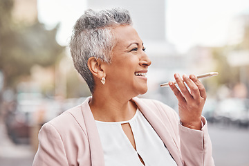 Image showing Senior woman, phone and voice note in the city for communication, conversation or discussion. Happy elderly female smiling and talking on smartphone for 5G connection or networking in an urban town