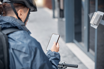 Image showing Mockup, bike or man with phone for delivery in city, street or road for GPS, location or networking outdoor. App, travel or male search with smartphone or communication, social media or 5g network