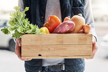 Image showing Grocery delivery, courier and hands of man with retail sales product, food shopping or vegetables shipping container. Logistics supply chain, health nutritionist and distribution person with package