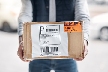 Image showing Fragile box, courier hands and delivery man with retail sales product, shopping stock or cardboard shipping container. Logistics supply chain, distribution service and person with cargo package label