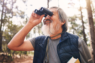 Image showing Binoculars, hiking and senior man in nature looking at view, sightseeing or watching. Binocular, adventure search and happy elderly male with field glasses, trekking or exploring on vacation outdoors