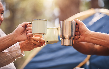 Image showing Camping hands, mugs and people toast on outdoor nature vacation for wellness, freedom or natural forest peace. Drinks, group cheers and relax friends celebrate on holiday adventure in Australia woods