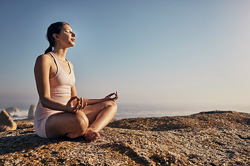 Image showing Relax and yoga and woman in lotus pose in nature for wellness, peace and zen on blue sky mockup. Fitness, girl and meditation, training and energy outdoor, mindset, breathing and posture workout