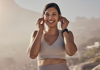 Image showing Portrait, fitness and music for woman in nature for running, training and cardio on blurred background. Happy, face and radio for girl outdoor for exercise, wellness and motivation with podcast track