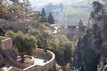 Image showing Panoramic view of hanging gardens of Cuenca over El Tajo Gorge with whitewashed houses of Ronda, Andalusia, Spain.