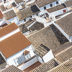 Image showing Aerial panoramic view of rooftops of white houses of Olvera town, considered the gate of white towns route in the province of Cadiz, Spain