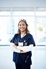 Image showing Doctor woman, crown and celebration portrait for career goals, achievement or success for smile in clinic. Happy medic, nurse and arms crossed with stethoscope, award or winning in hospital workplace