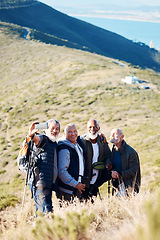 Image showing Senior, men and hiking selfie in nature, happy and relax, cheerful and smile on blue field background. Elderly, friends and man hiker group bond with picture, photo and memory of retirement activity