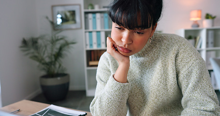 Image showing Burnout, tired and depression with a business woman working on a laptop in her home office and feeling bored or sad. Mental health, report and overtime with a young female employee at work alone