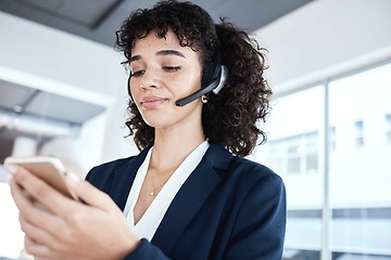 Image showing Black woman, phone texting and call center for communication, email or typing on chat app. Girl networking, smartphone or reading on iot ux, planning or social media for start to morning in workplace