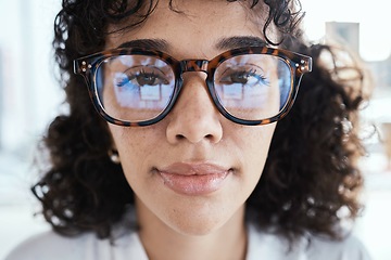 Image showing Portrait, therapist and face of woman with glasses, spectacles or eyewear feeling calm and focused. Head, vision and closeup of employee or worker looking serious with eyesight in an office