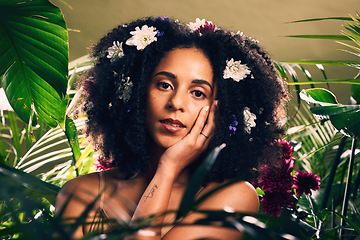 Image showing Beauty, flowers and portrait of woman in studio for wellness, skincare and creative advertising in jungle. Face, skin and girl model relax in zen, peace and product from nature, forest and aesthetic