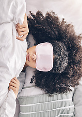 Image showing Relax, beauty sleep and black woman with eye mask in bed, dream and refresh body and mind in apartment from above. Dreaming, rest and relaxation, girl sleeping late on weekend morning in cozy bedroom