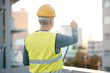 Image showing Building, construction and senior man with vision, planning and thinking of architecture design in city. Engineering, urban development and handyman, maintenance worker and contractor writing ideas