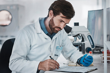 Image showing Report, blood sample and scientist writing results of healthcare, research and science analytics. Data, medicine and man doing an investigation of dna with notes, paperwork and a document at a lab