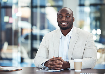 Image showing Success, corporate and portrait of a black man in an office for a meeting, planning and seminar. Trust, smile and African businessman sitting at a table ready for a conference, workshop or interview