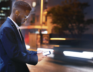 Image showing Phone, business and black man in city at night, street or outdoors in town for texting. 5g mockup, technology and male employee with smartphone for social media, internet browsing or web scrolling.