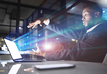 Image showing Hologram, futuristic light and black man with laptop in office workplace at night. Technology, future mockup and male employee with computer for 3d business, digital transformation or holographic.