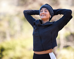 Image showing Hiking, freedom and mockup with a woman in nature, outdoor for a hike in the woods or forest. Fitness, relax and a female hiker enjoying a quiet or peaceful walk outside in the natural wilderness