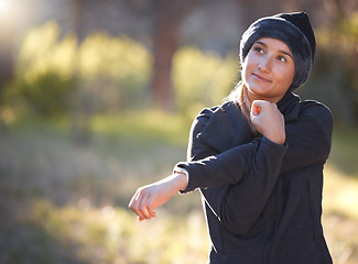 Image showing Hiking, idea and mockup with a woman thinking in nature, outdoor for a hike in the woods or forest. Fitness, warm up and a female hiker getting ready for a walk outside in the natural wilderness